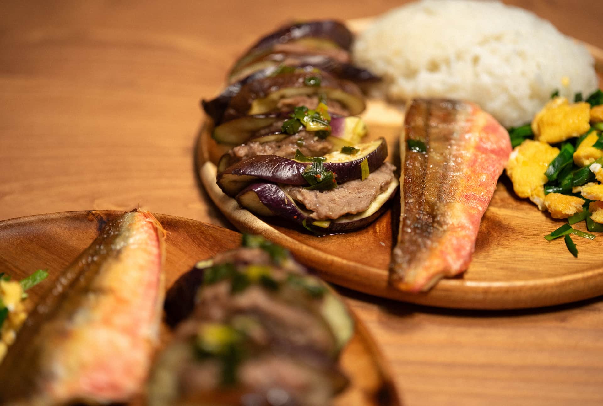 Two plates of cooked food photographed side by side