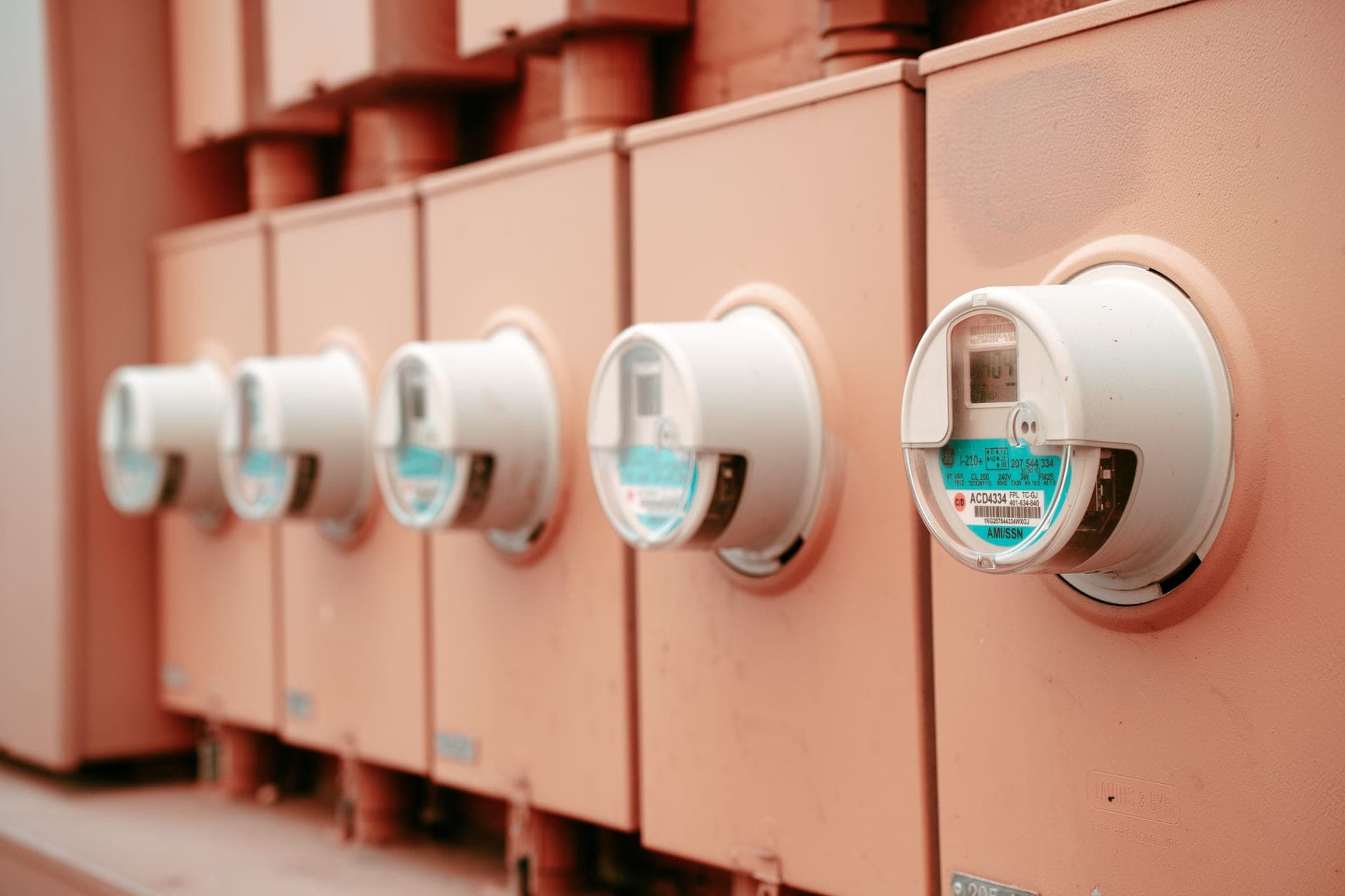 A row of residential electricity meters